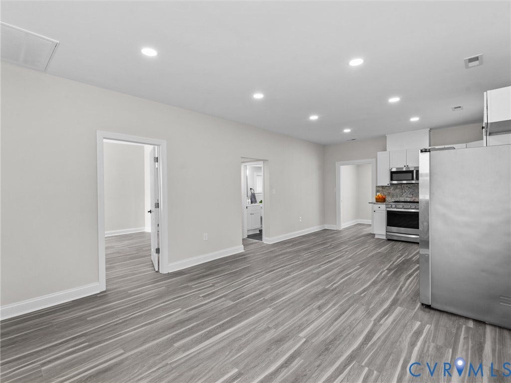 3059 Decatur Street, Richmond, VA 23224 Open-concept living space featuring recessed lighting, new flooring,