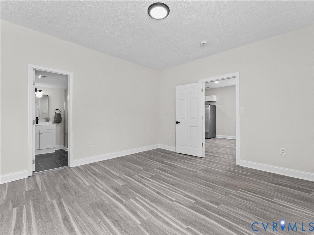 3059 Decatur Street, Richmond, VA 23224 Primary bedroom with ensuite full bathroom and closet