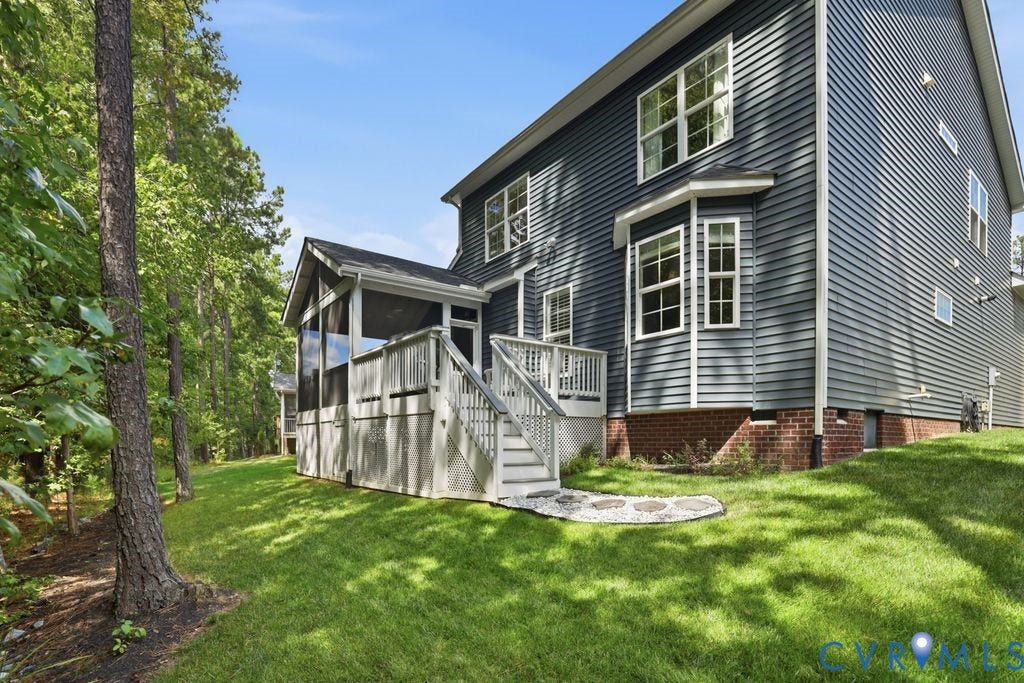 Private, tree lined backyard