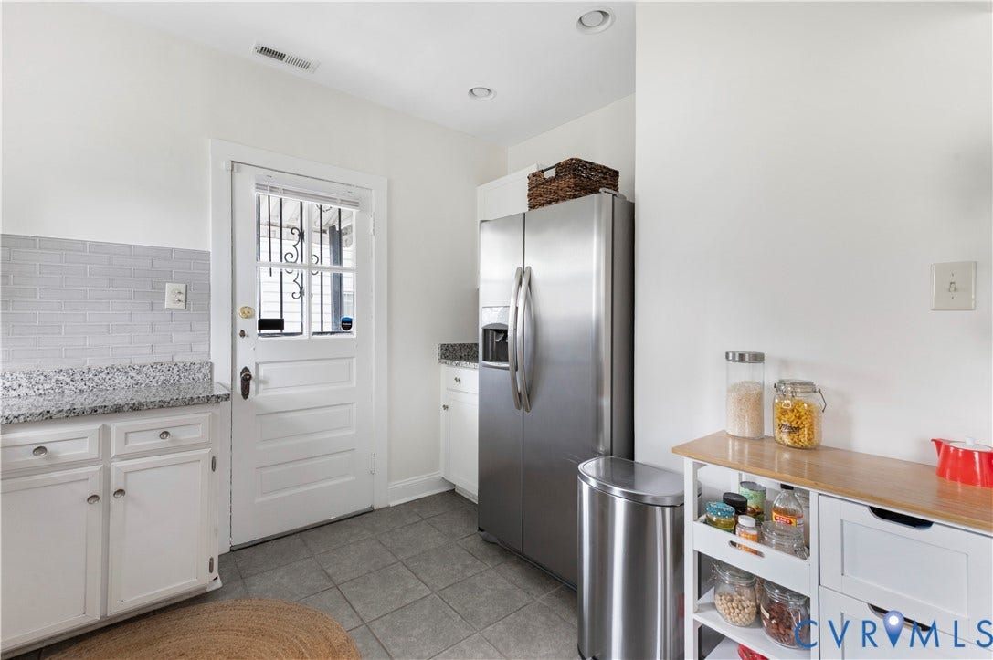 613 Rothesay Road, City Stadium, Richmond, VA 23221 Kitchen featuring white cabinetry, gray subway tile backsplash, speckled countertops, and gray tile flooring