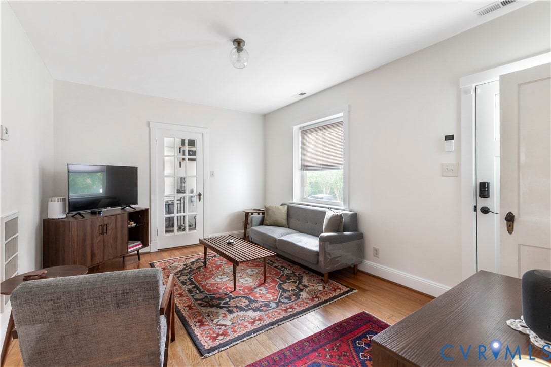613 Rothesay Road, City Stadium, Richmond, VA 23221 Hardwood flooring, white walls, and a window with blinds