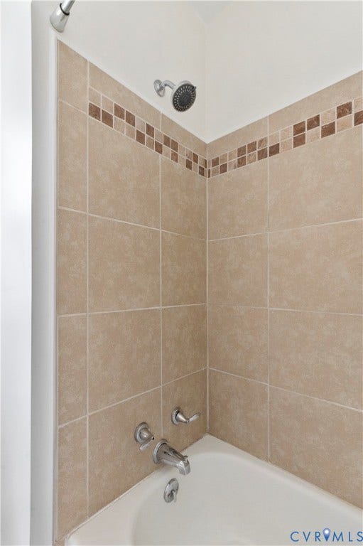 613 Rothesay Road, City Stadium, Richmond, VA 23221 Tiled shower surround with decorative accent band and chrome fixtures