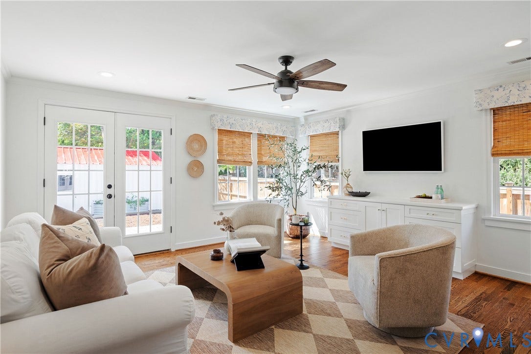 4919 Park Avenue, Near West End, Richmond, VA 23226 Hardwood flooring, recessed lighting, ceiling fan, white paneled French doors, and built-in cabinetry