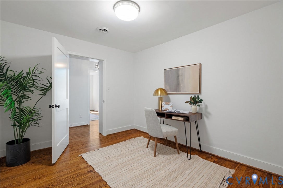 4919 Park Avenue, Near West End, Richmond, VA 23226 Hardwood flooring, crisp white walls, and a recessed ceiling light create a bright atmosphere
