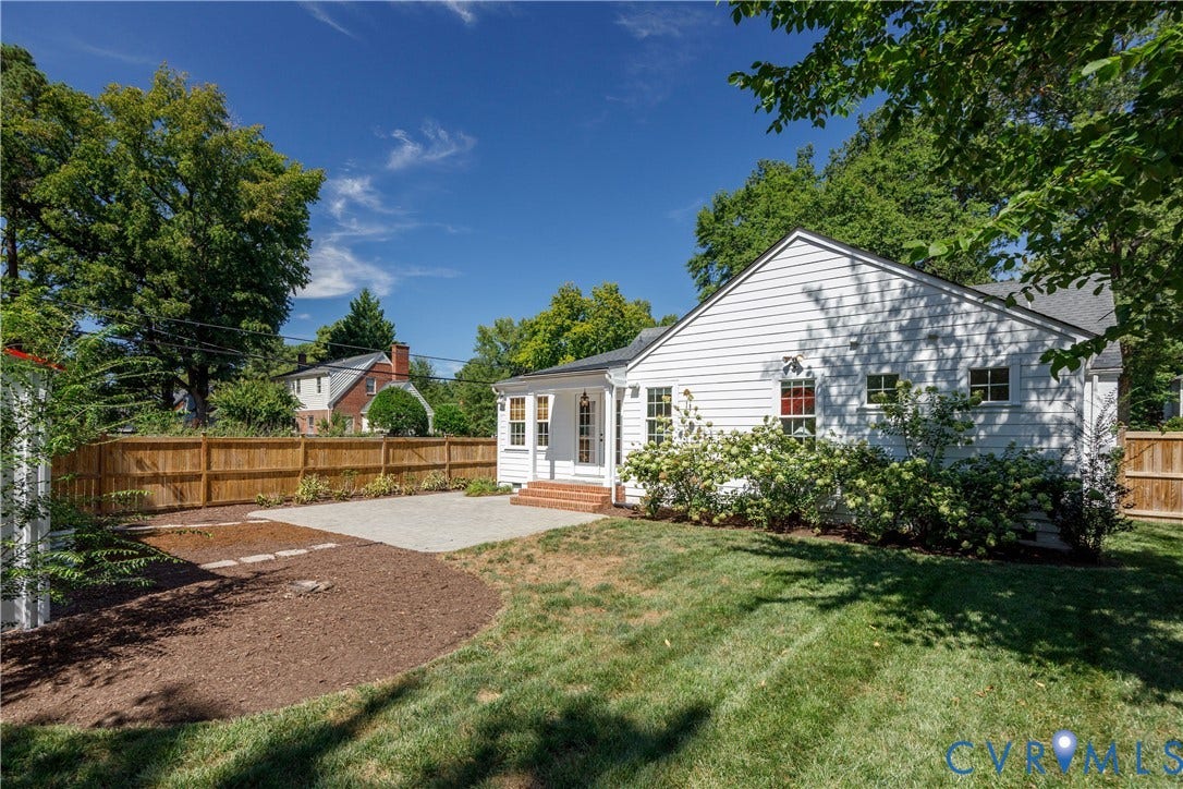 4919 Park Avenue, Near West End, Richmond, VA 23226 White siding exterior with a dark shingle roof