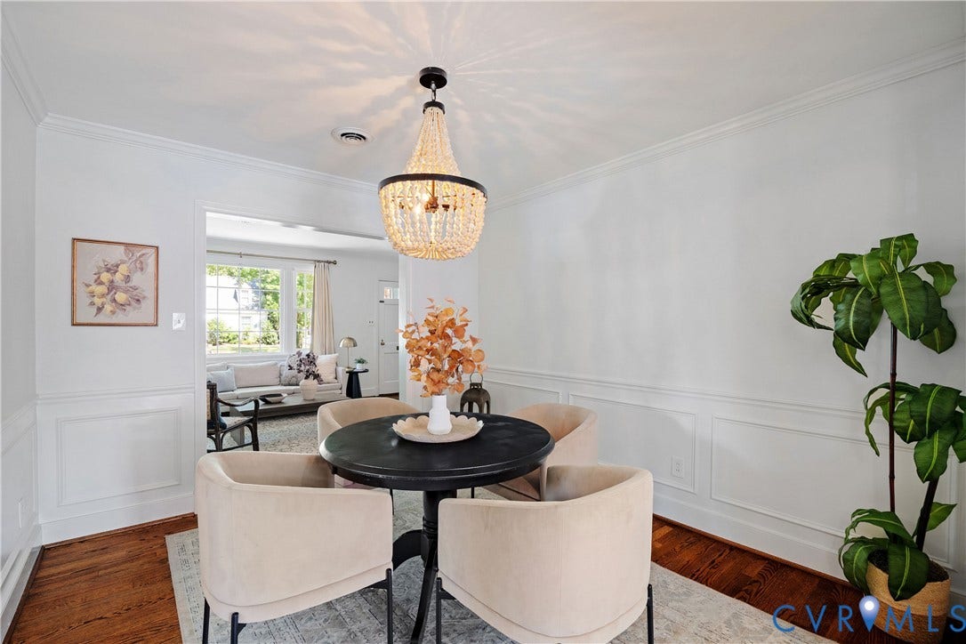 4919 Park Avenue, Near West End, Richmond, VA 23226 Hardwood flooring, decorative wainscoting, crown molding, and a crystal chandelier