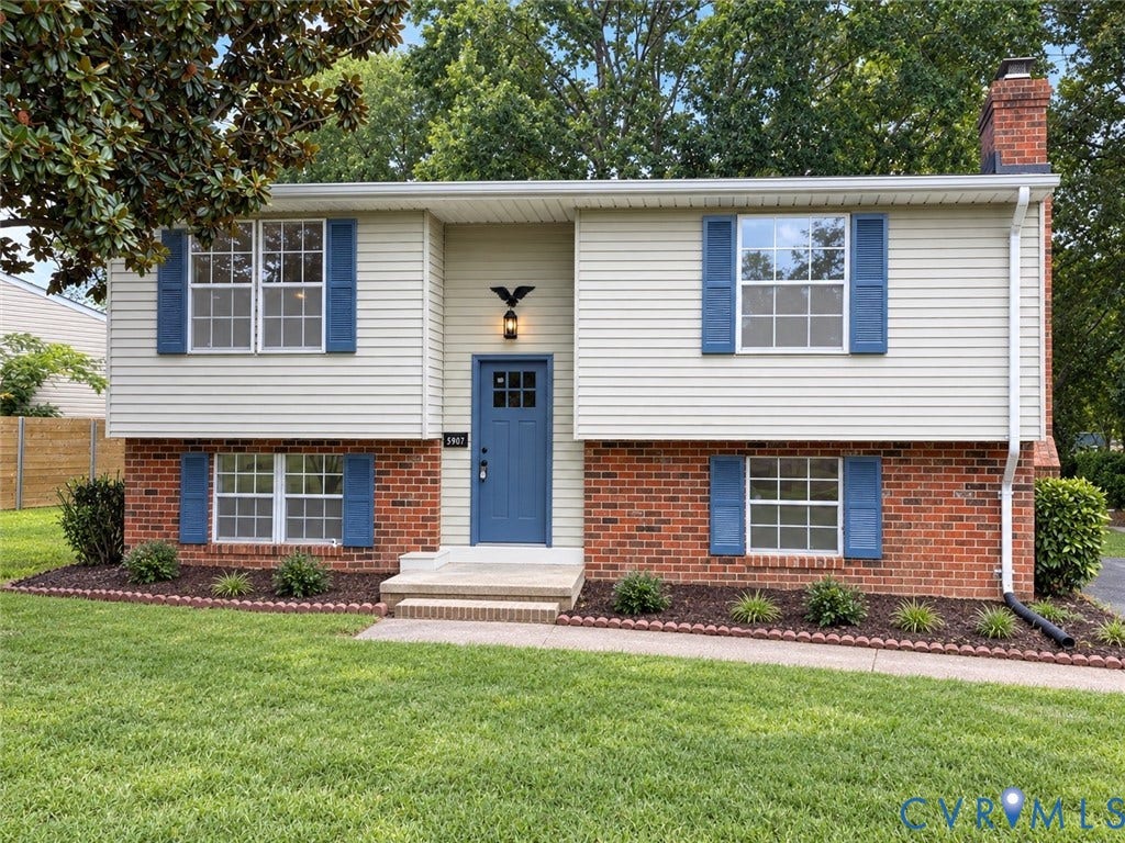 5907 Stella Road, Richmond, VA 23234 Split-level residence featuring a brick foundation and light-colored siding