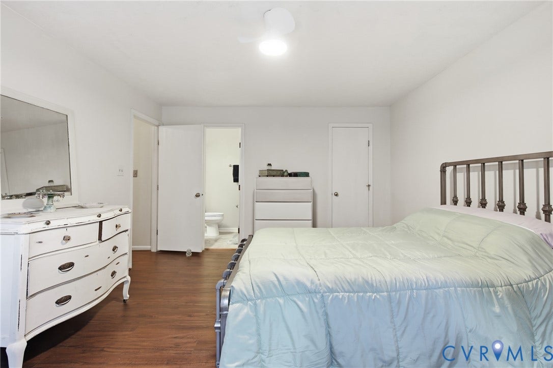 LVP flooring and flush-mounted ceiling fan with light fixture