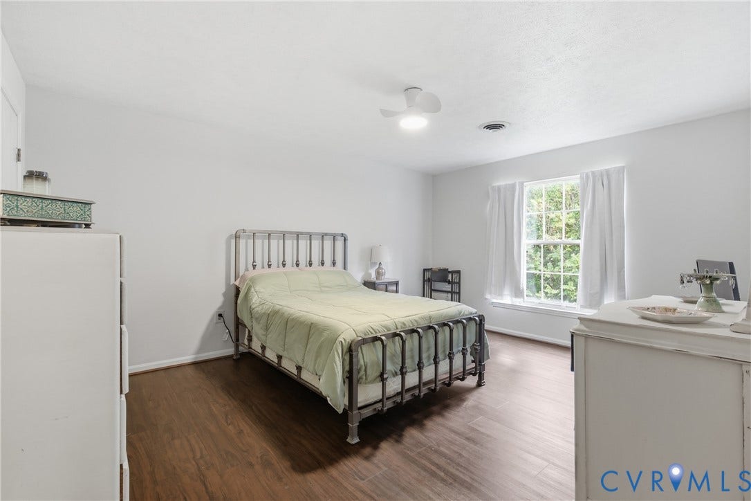 LVP flooring, and a ceiling fan with integrated lighting