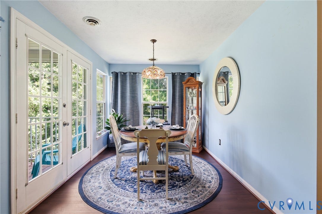 LVP flooring, French doors, lots of natural light