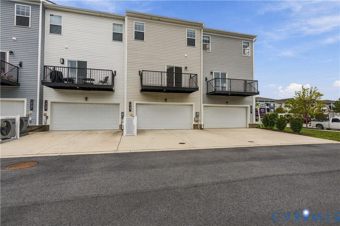 Attached garages with concrete driveways
