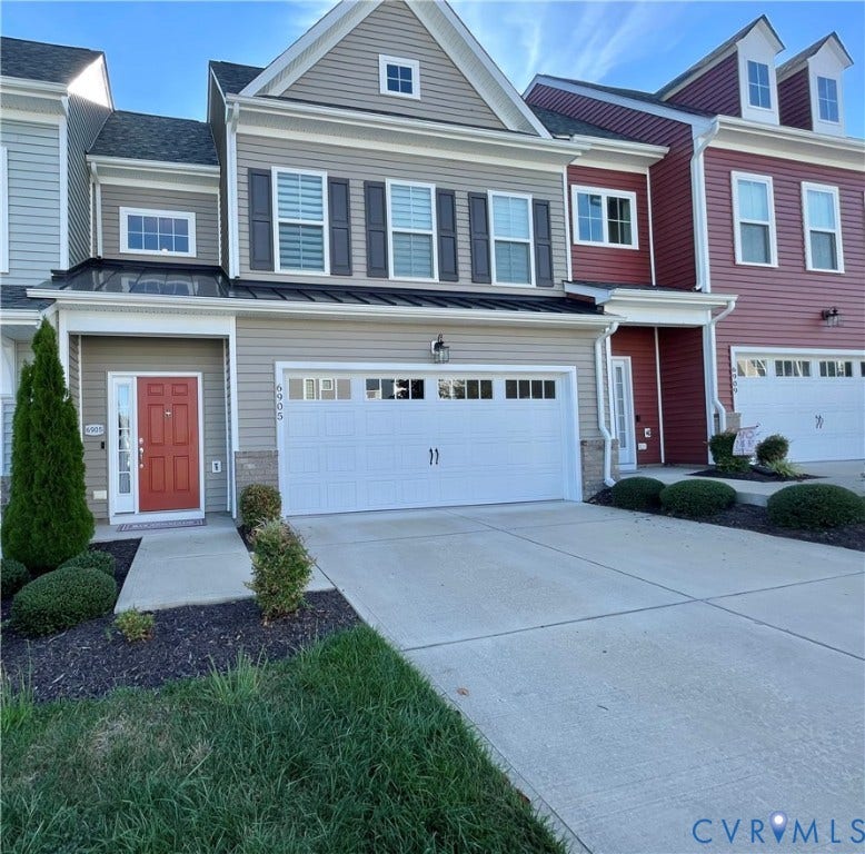 6905 Leire Lane, Chesterfield, VA 23832 Contemporary multi-level exterior with varied siding, front-facing attached garage, and prominent gabled roofline