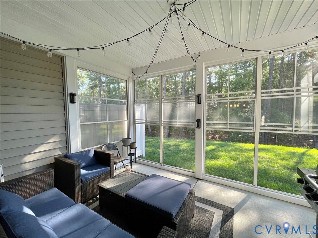 6905 Leire Lane, Chesterfield, VA 23832 Screened-in porch with concrete flooring, vaulted ceiling, and exterior siding