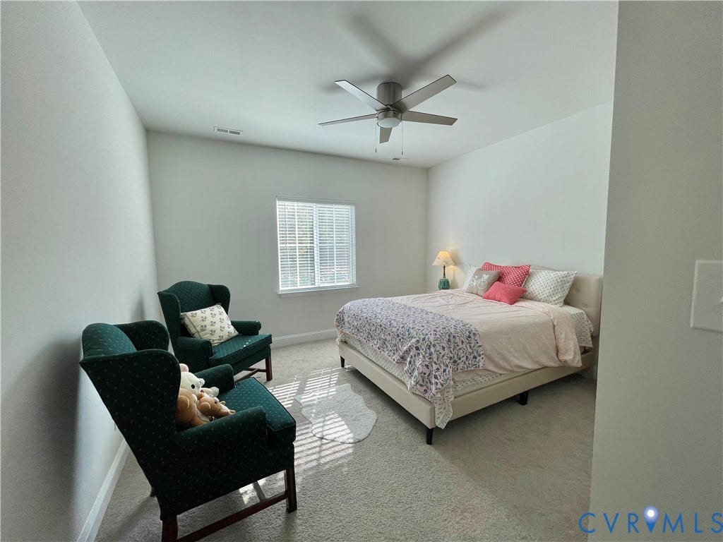 6905 Leire Lane, Chesterfield, VA 23832 Carpeted room with a ceiling fan, window with blinds, and white walls