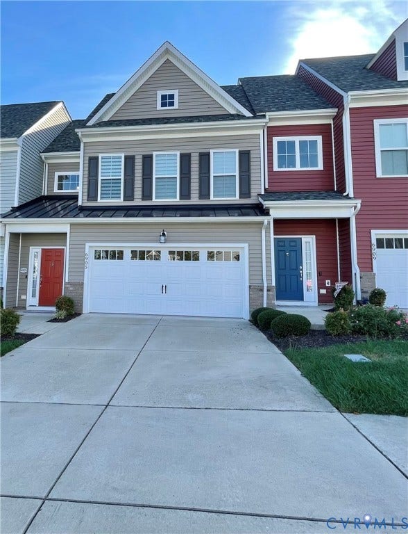 6905 Leire Lane, Chesterfield, VA 23832 Two-car garage, concrete driveway, and established front landscaping