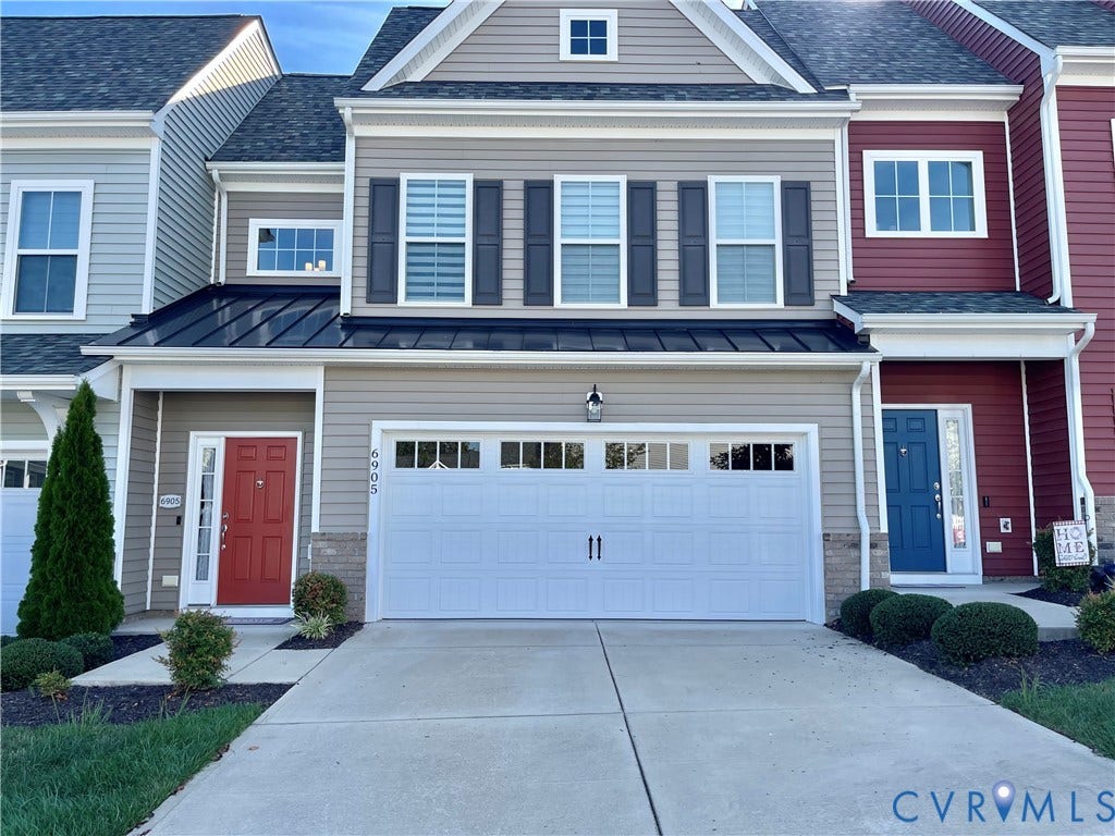 6905 Leire Lane, Chesterfield, VA 23832 Siding exterior with decorative shutters, a single-car garage, concrete driveway, and front landscaping