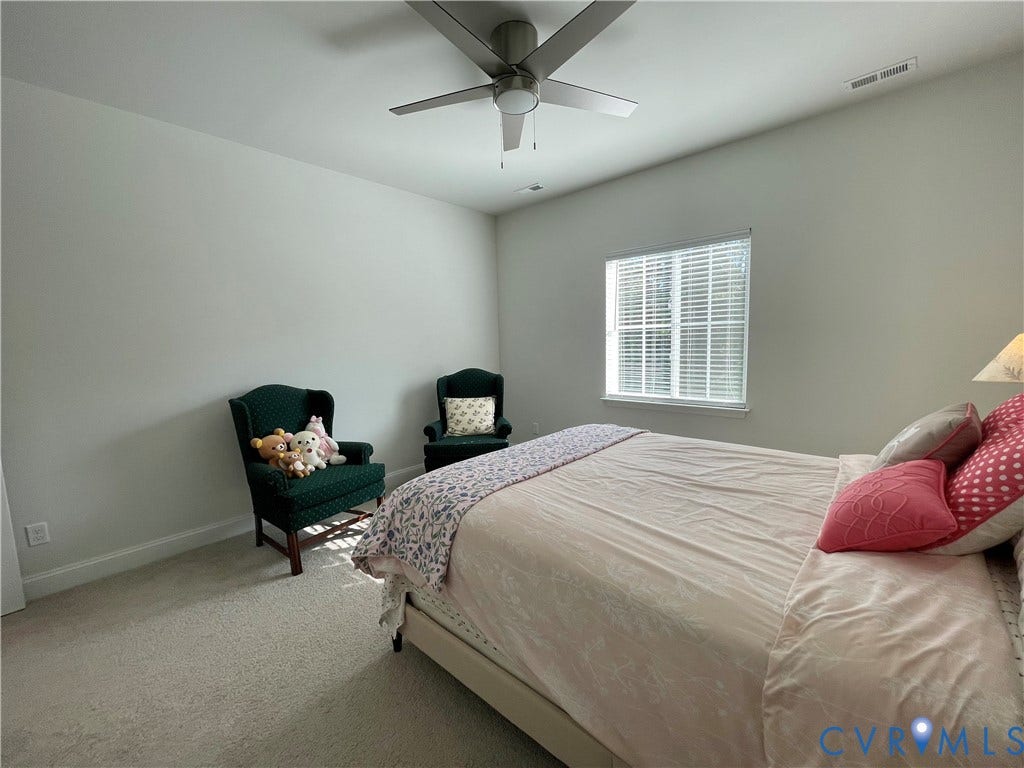 6905 Leire Lane, Chesterfield, VA 23832 Carpeted flooring, window with blinds, ceiling fan with integrated lighting, recessed lighting, and light neutral wall tones