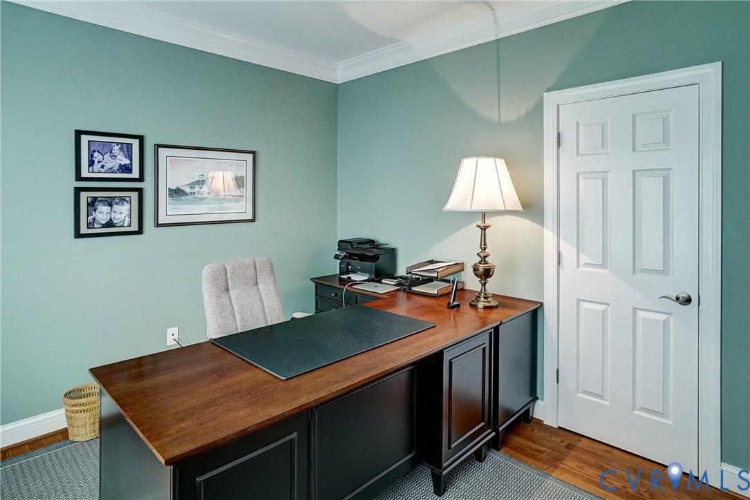 4938 Grey Oaks Villas Drive, Glen Allen, VA 23059 Wood-finish flooring, crown molding, and a paneled interior door