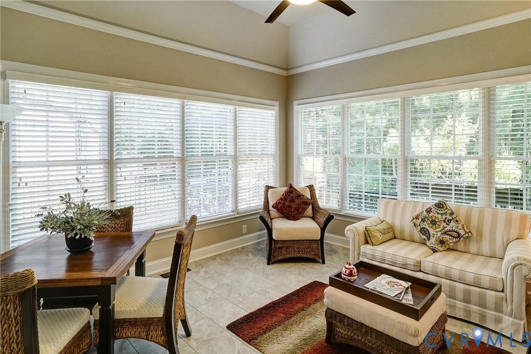 4938 Grey Oaks Villas Drive, Glen Allen, VA 23059 Vaulted ceiling, ceiling fan, extensive windows, crown molding, and tile flooring