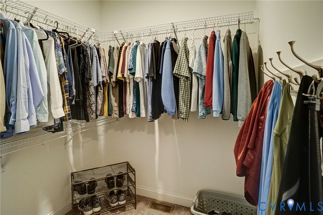 4938 Grey Oaks Villas Drive, Glen Allen, VA 23059 White wire shelving system with hanging rods and corner configuration