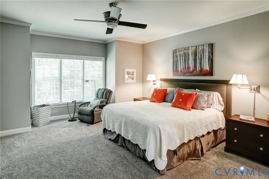4938 Grey Oaks Villas Drive, Glen Allen, VA 23059 Wall-to-wall carpeting with a ceiling fan, crown molding, and large window with blinds