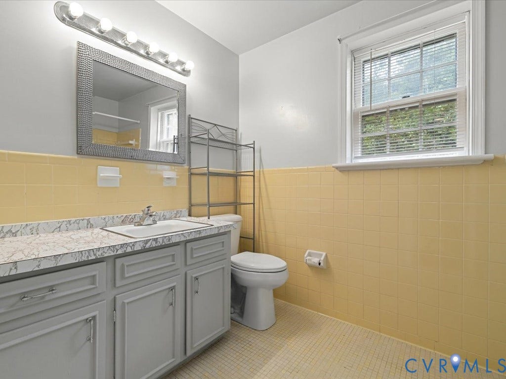 4630 Melody Court, Meadowbrook West, North Chesterfield, VA 23234 Bathroom featuring a vanity with a white countertop, recessed sink, and gray cabinetry