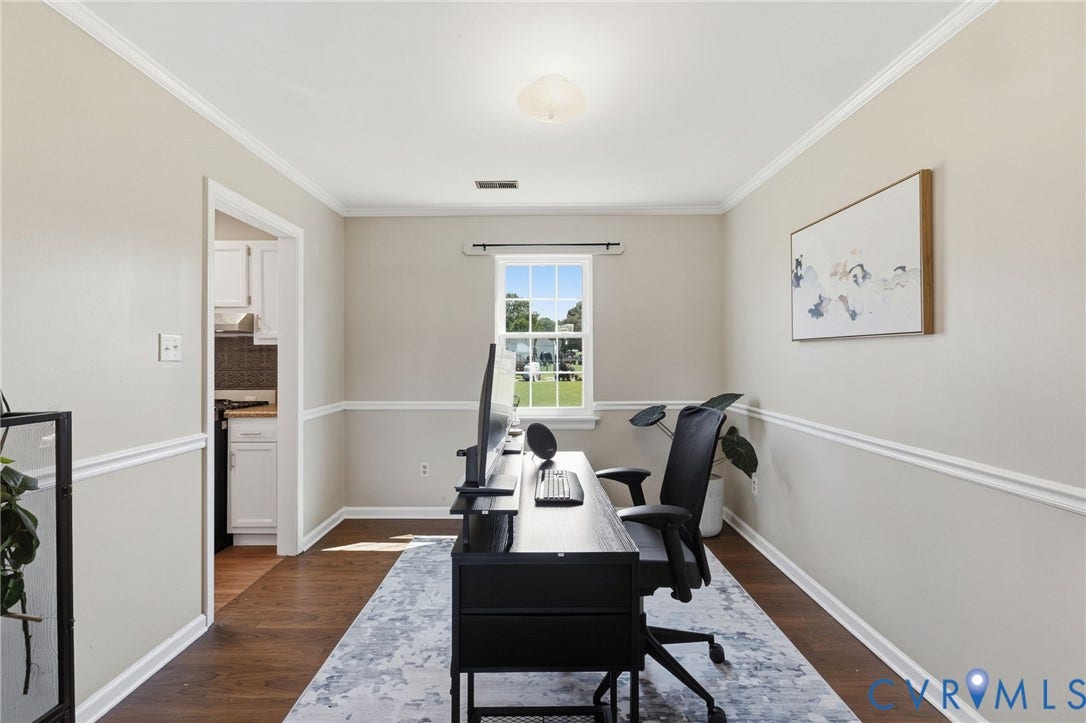 4429 Crown Squire Road, Henrico, VA 23231 Wood-finish flooring, crown molding, chair rail molding, and a ceiling-mounted light fixture