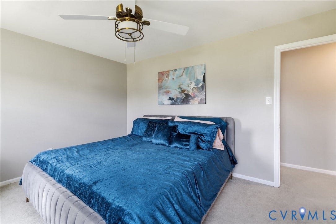 4429 Crown Squire Road, Henrico, VA 23231 Carpeted flooring, neutral wall tones, ceiling fan with integrated lighting, and white trim