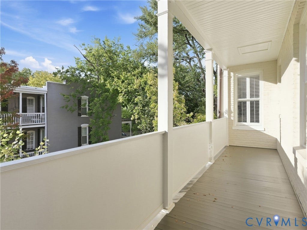1829 Floyd Avenue, The Fan, Richmond, VA 23220 Covered porch with painted wood flooring, white painted support columns, and a white paneled ceiling