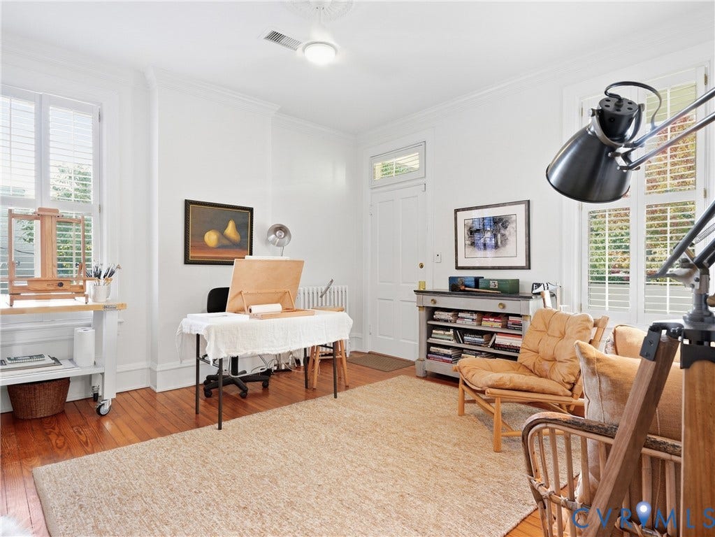 1829 Floyd Avenue, The Fan, Richmond, VA 23220 Hardwood flooring, crown molding, white painted walls, recessed lighting, and window shutters