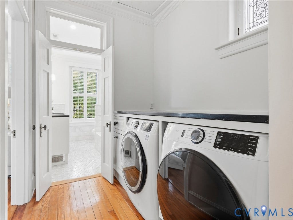 1829 Floyd Avenue, The Fan, Richmond, VA 23220 Hardwood flooring, built-in newer laundry appliances, black countertop convenient for folding.
