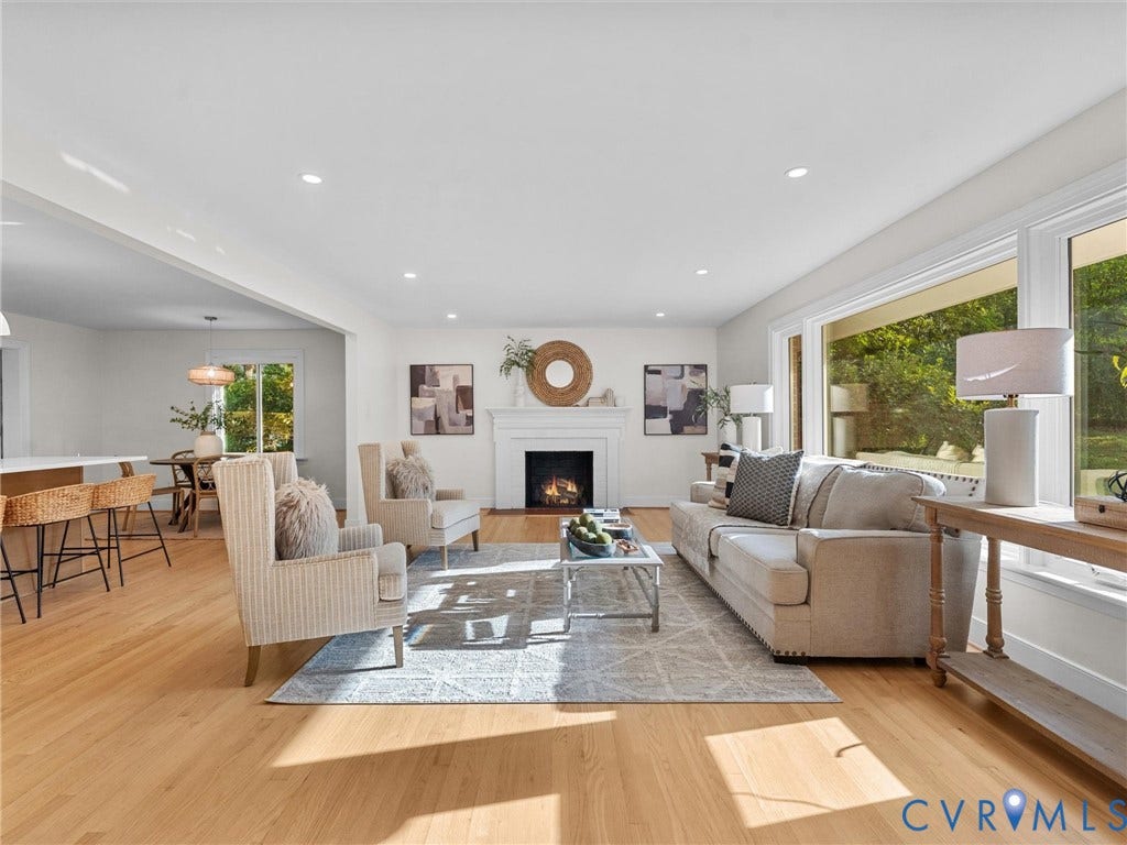 3436 Kenmore Road, Richmond, VA 23225 Hardwood flooring throughout, recessed ceiling lighting, fireplace with a mantle, bright window, and an open-concept design
