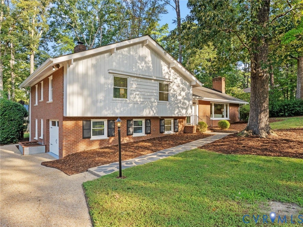 3436 Kenmore Road, Richmond, VA 23225 Brick facade with white siding accents