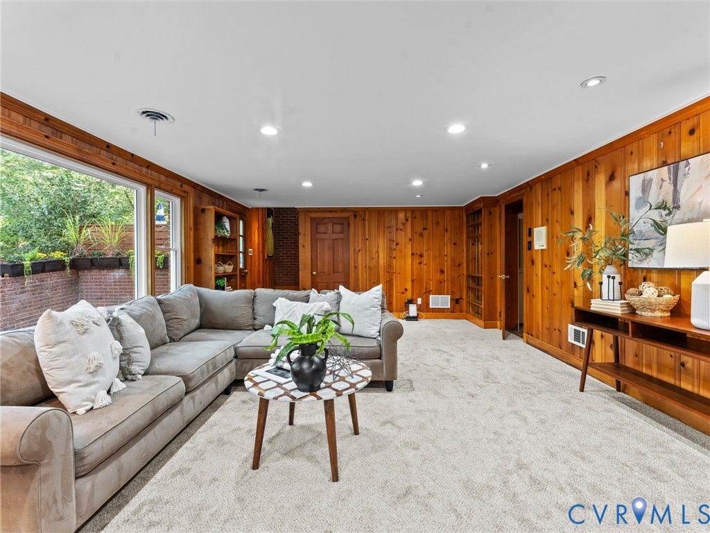 3436 Kenmore Road, Richmond, VA 23225 Full-height paneled walls, recessed ceiling lighting, and expansive windows