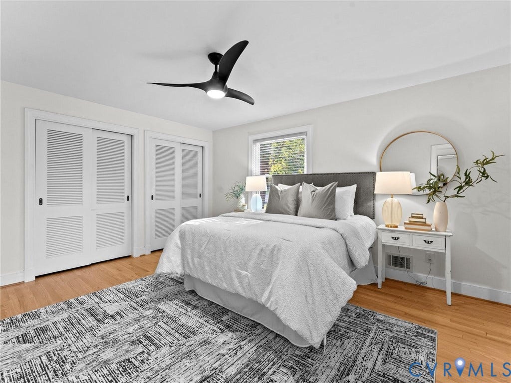 3436 Kenmore Road, Richmond, VA 23225 Hardwood flooring, two sets of louvered bi-fold closet doors, and a contemporary ceiling fan with integrated lighting