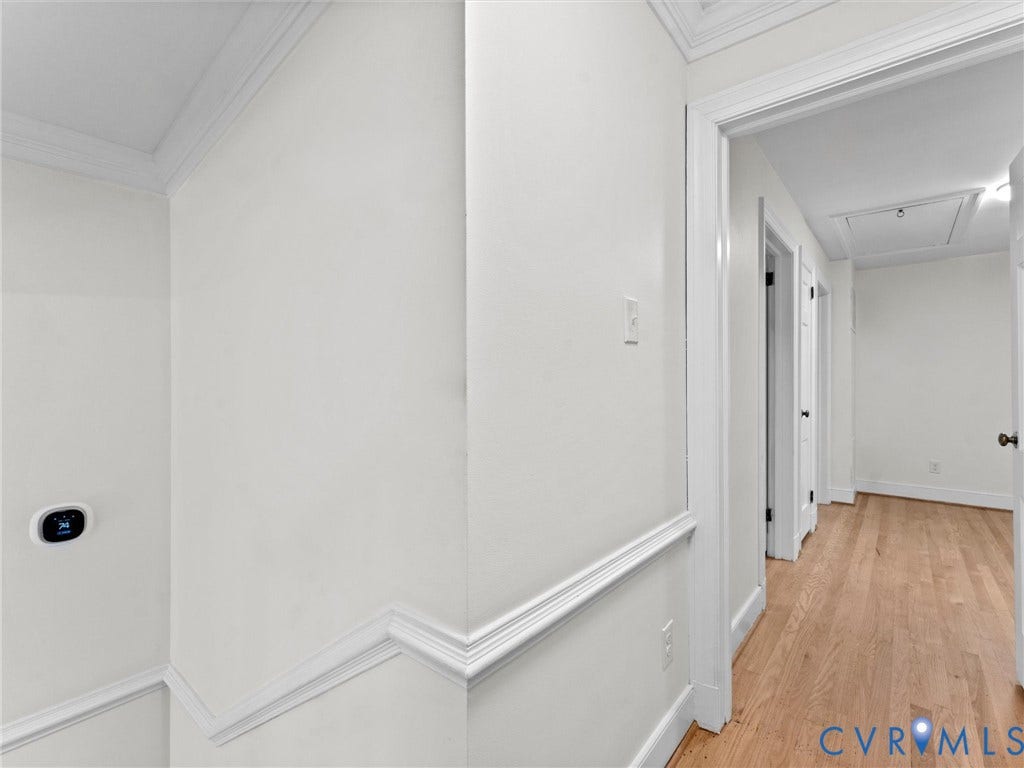 3436 Kenmore Road, Richmond, VA 23225 Hardwood flooring extends throughout the hallway