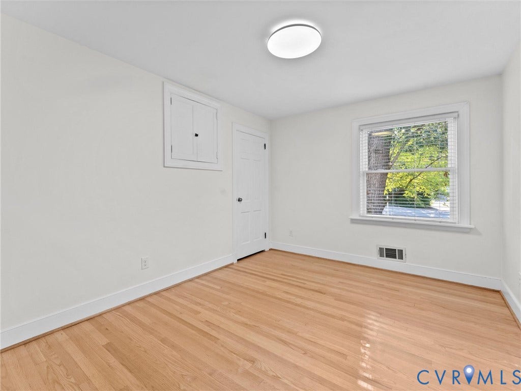 3436 Kenmore Road, Richmond, VA 23225 Hardwood flooring, white painted walls, window with white blinds, flush mount ceiling light, white trim