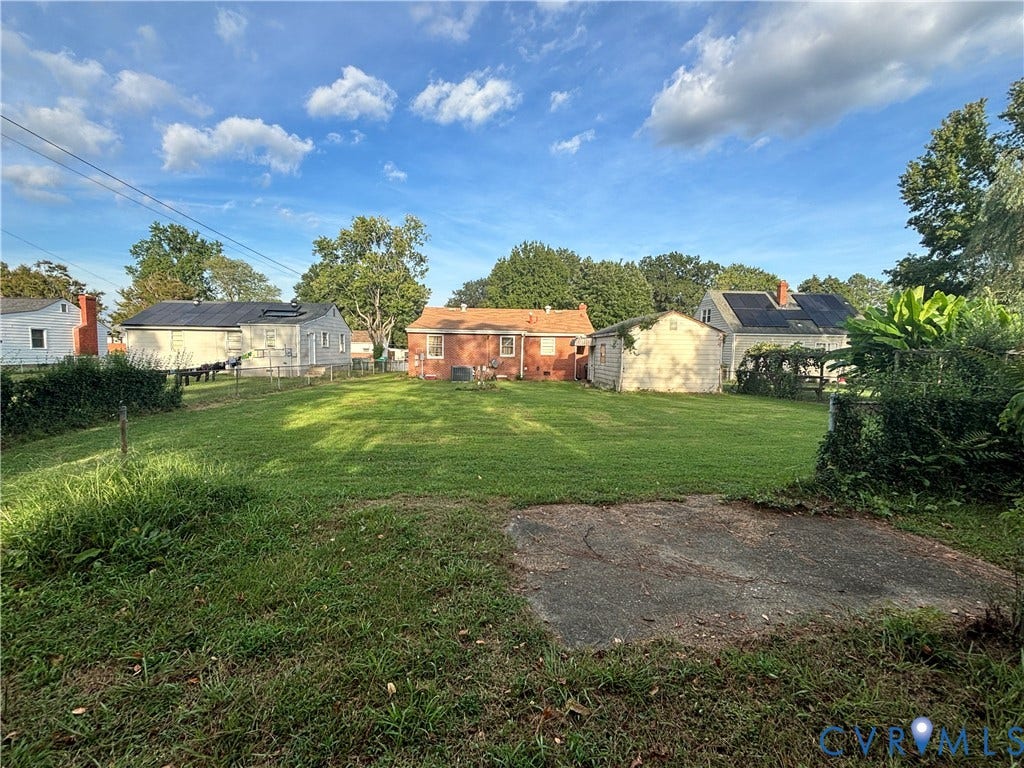 3510 Howard Road, Richmond, VA 23223 Expansive green lawn with mature trees