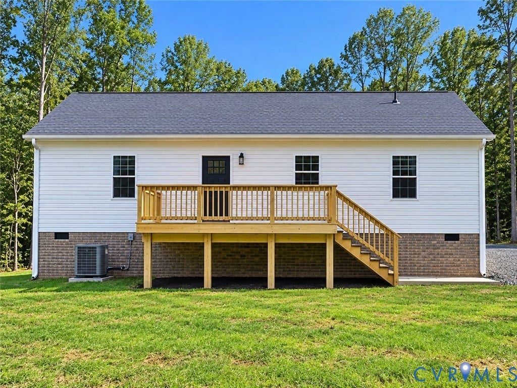 1010 Johnson Road, Mineral, VA 23117 White horizontal siding exterior with a dark shingle roof
