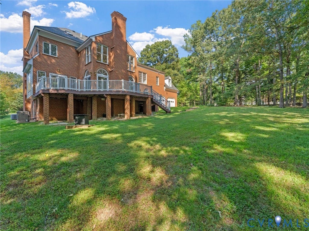 Expansive green lawn providing abundant outdoor space