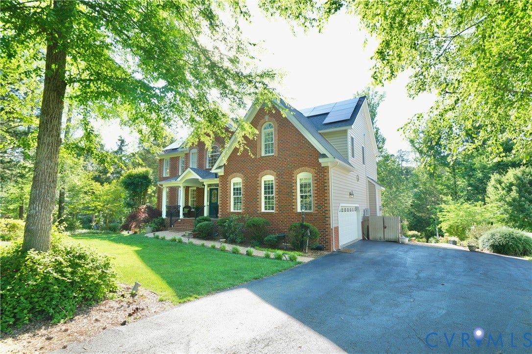 12669 Fawn Lane, Goochland, VA 23233 Traditional brick exterior with an arched entry porch