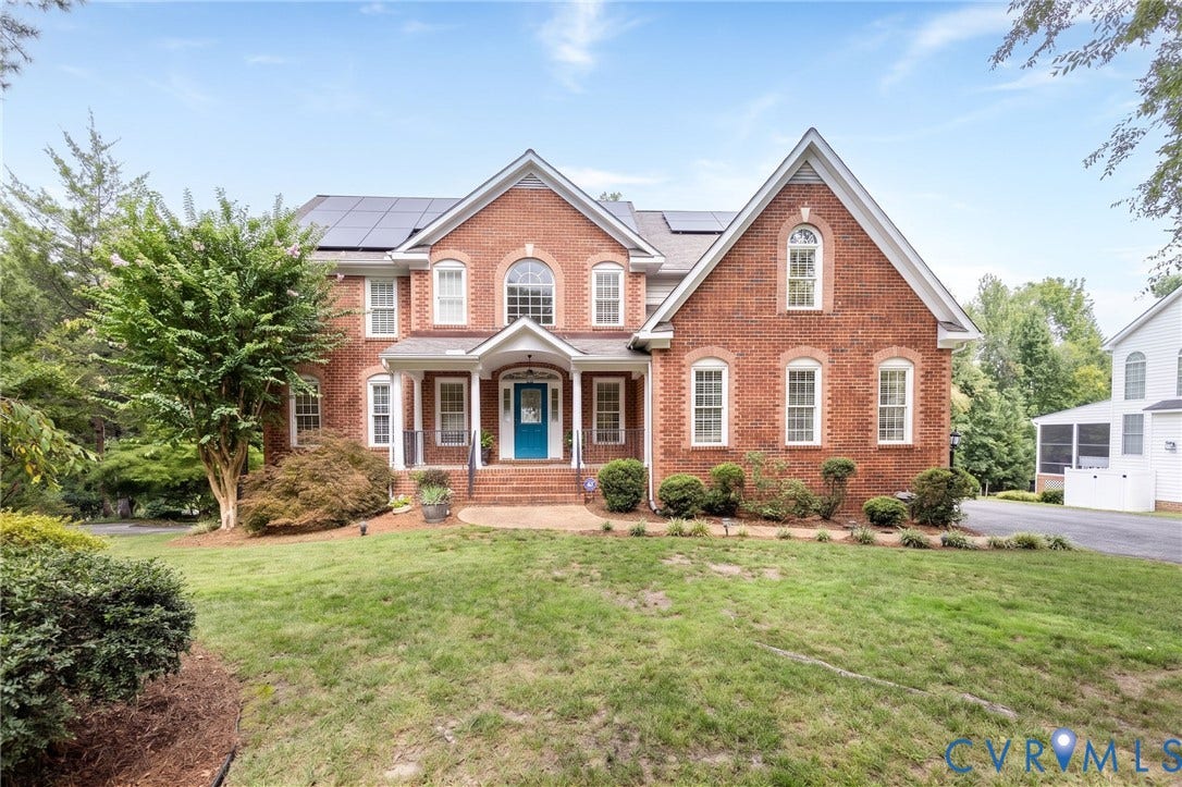 12669 Fawn Lane, Goochland, VA 23233 Traditional brick exterior with white trim, arched windows, and a covered porch entry