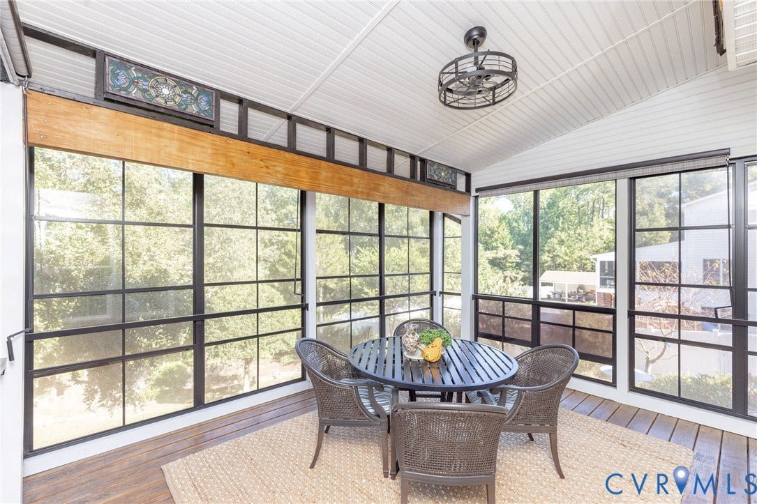 12669 Fawn Lane, Goochland, VA 23233 Enclosed porch featuring wood-finish flooring, a white paneled ceiling, black-framed windows, and a ceiling fan