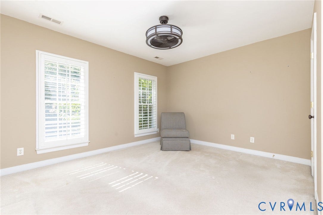 12669 Fawn Lane, Goochland, VA 23233 Recessed ceiling fan, two windows with plantation shutters, neutral wall color, and carpeted flooring