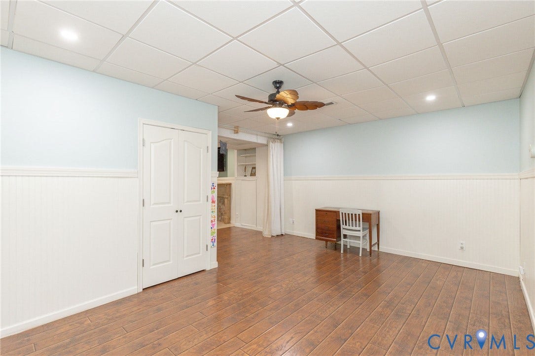 12669 Fawn Lane, Goochland, VA 23233 Wood-finish flooring, drop-tile ceiling with recessed lighting, ceiling fan, wainscoting