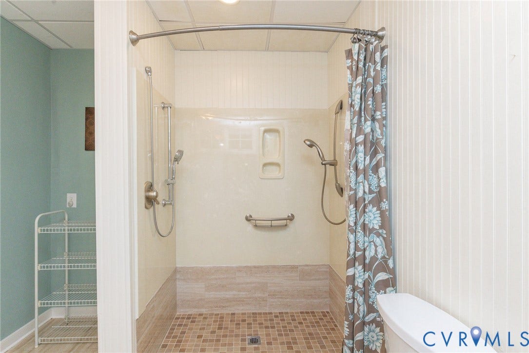 12669 Fawn Lane, Goochland, VA 23233 Walk-in shower with tiled floor, brushed nickel fixtures, and grab bar