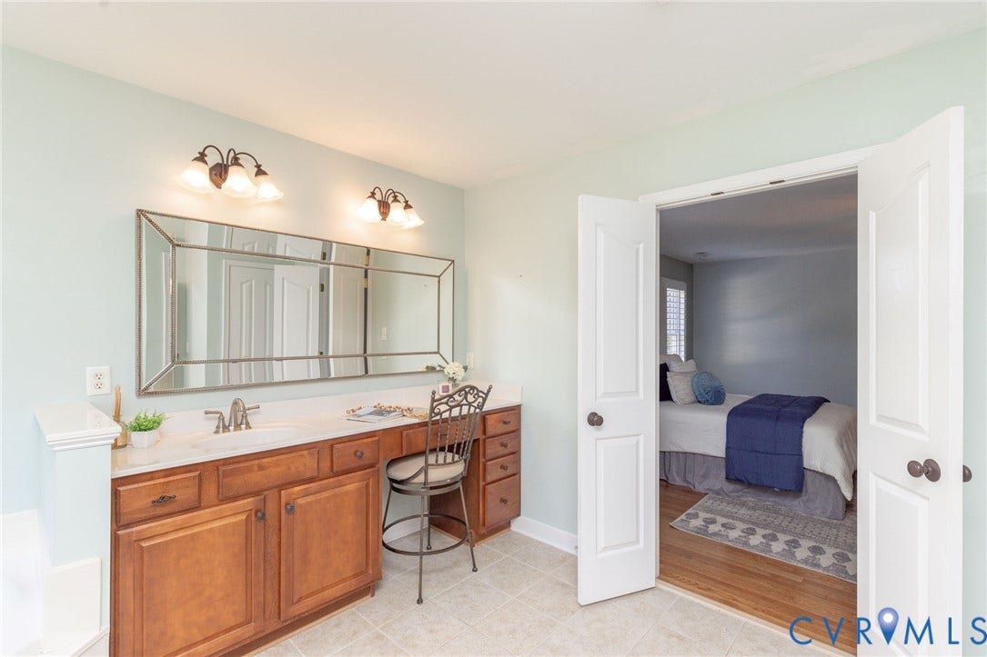 12669 Fawn Lane, Goochland, VA 23233 Dual vanity with integrated makeup area and storage cabinetry
