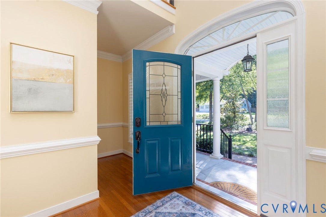 12669 Fawn Lane, Goochland, VA 23233 Hardwood-finish flooring, decorative transom window, ornate glass door insert, white crown molding, and white chair rail