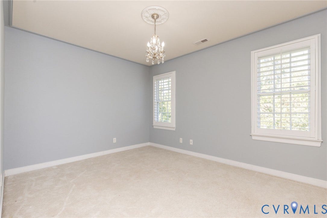 12669 Fawn Lane, Goochland, VA 23233 Plush carpeting, two windows with plantation shutters, ceiling-mounted chandelier, decorative ceiling medallion