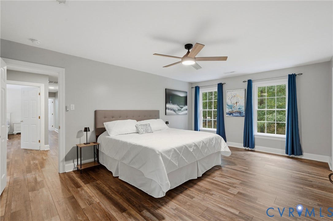 11150 Hames Lane, Glen Allen, VA 23059 Primary bedroom with LVP flooring and ceiling fan